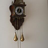 Antieke mooie wandklok