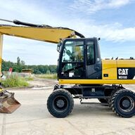 Cat M315D - 360° Engcon Rotating Bucket + Grapple