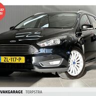 Ford FOCUS Wagon 1.0 Titanium /Camera! /Apple Carplay/Dodehoek detectie! /Stuur + Stoelverwarming! /Navi! /Climat /Cruise /Elek. pakket /Bluetooth /17&amp;quot;LMV /LED Dagrijverl. /PDC V+A! /Extra getint glas /Chroom!