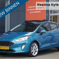 Ford Fiesta 1.0 EcoBoost Titanium | Schuif/kantel dak | Lichtmetalen velgen | Keyless entry | Camera | Navi | Climate control Adaptive cruise